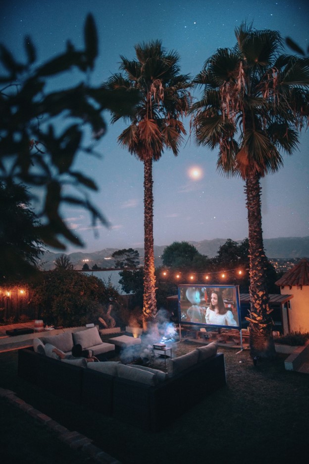 outdoor projector screen with palm trees